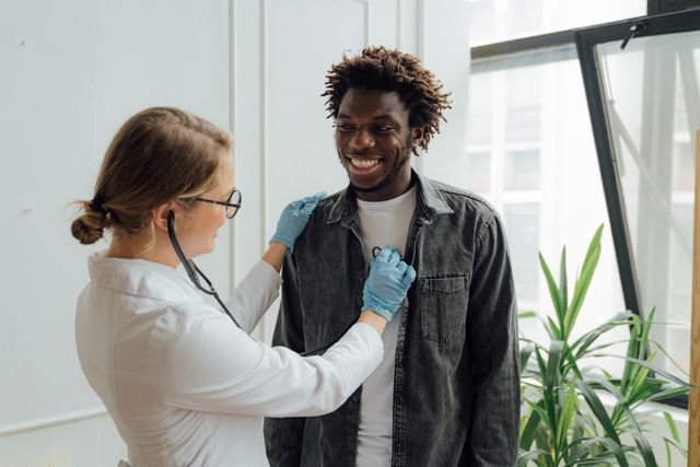 Doctor discussing a diagnostic billing add-on with a patient during an annual physical