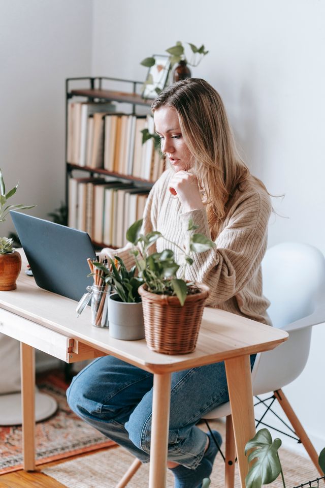 Self-employed worker on a video call with a licensed insurance broker discussing 2027 health coverage options