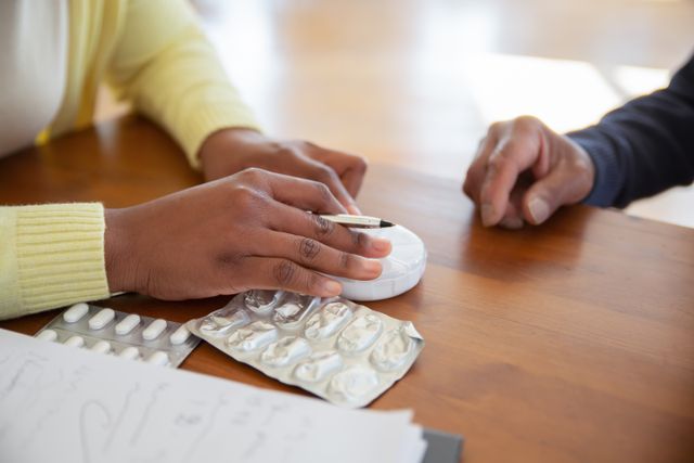 Parent comparing employer health insurance offer against ACA marketplace options on a laptop