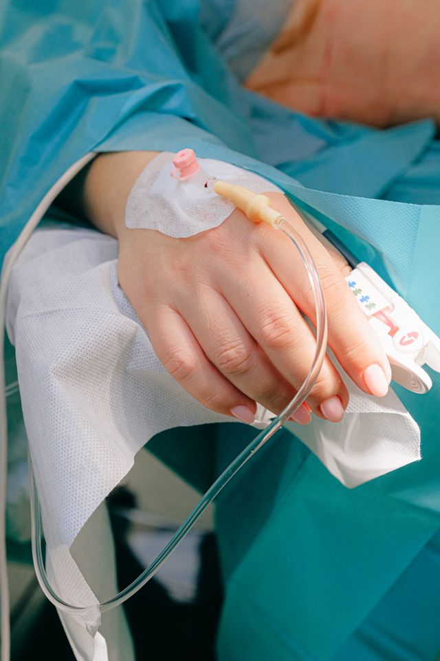 Person reviewing a Medicare IRMAA premium notice and tax documents